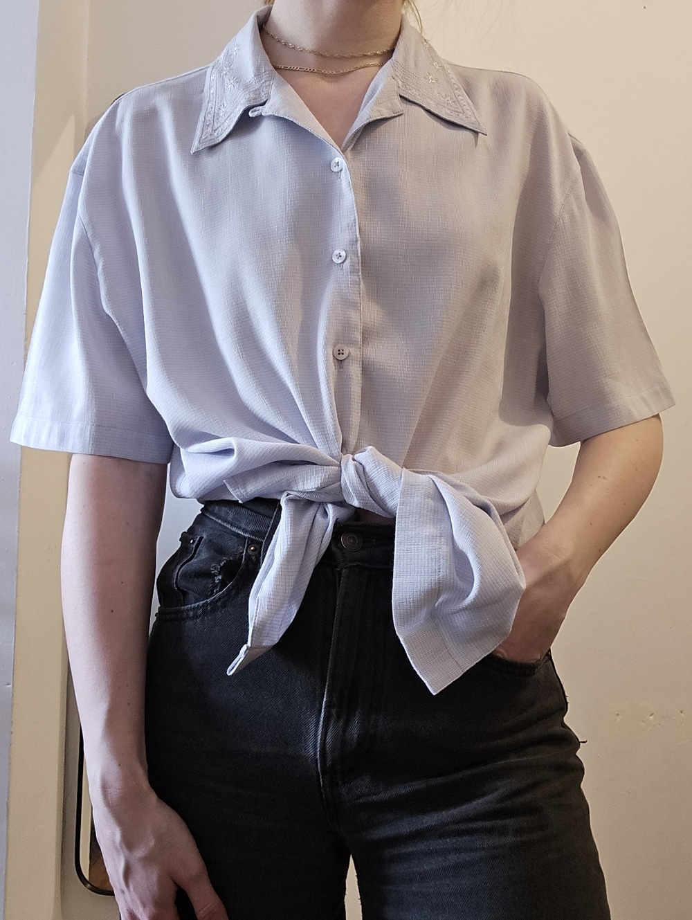 Short sleeve blue shirt with floral collar